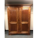 A good quality mahogany double door wardrobe,