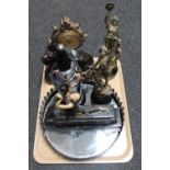 A contemporary mirrored tray together with a contemporary figural lion mantel clock,