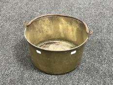 An antique brass jam pan