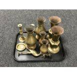 A tray of antique and later brass ware - candlesticks, vases,