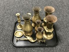 A tray of antique and later brass ware - candlesticks, vases,