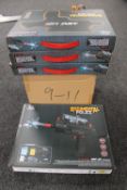 Four Regimental Police mini uzi water pellet guns with box containing approximately 40,