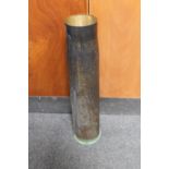 A large brass ammunition shell