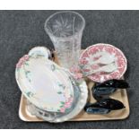 A tray of lead crystal vase, Maling lustre dish and salad servers, two Poole dolphins,