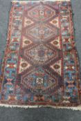 An antique Caucasian rug,