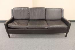 A mid twentieth century Danish brown leather three seater settee CONDITION REPORT: