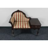 A mahogany effect telephone table in striped fabric