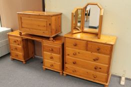 A pine six drawer dressing table with triple mirror,