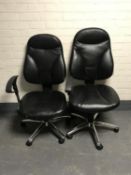 A black leather and mesh high back swivel office armchair together with a further black leather