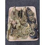 A tray containing a quantity of horse brasses,
