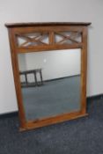 A sheesham wood overmantel mirror