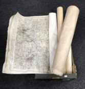 A box of assorted 20th century rolled maps