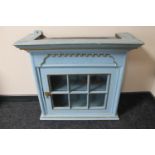 A late 19th century painted oak wall cabinet