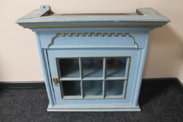 A late 19th century painted oak wall cabinet