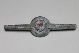 A Morris Cooper car badge