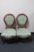 A pair of continental mahogany salon chairs