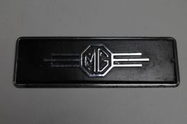 An MG car badge