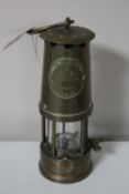 A brass Eccles Protector Type 6 miner's lamp