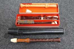 A tray of three recorders including two by Schott's and another by Rosetti