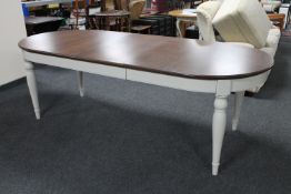 A painted D-end extending dining table