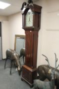 A George III mahogany eight day longcase clock with painted dial signed William Rust, Hull,