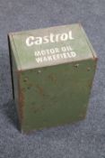 A metal drawer bearing Castrol advertising