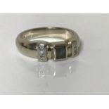 A 14ct white gold sapphire and diamond ring,