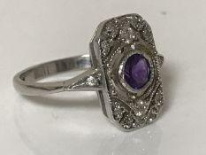 A 9ct gold amethyst and diamond ring