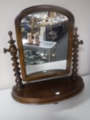 A Victorian oak toilet mirror