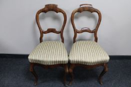 A pair of continental mahogany dining chairs