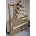 A contemporary single bed frame with storage drawers