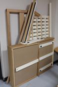 A contemporary single bed frame with storage drawers