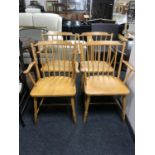 A set of four ash spindle back kitchen chairs