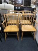 A set of four ash spindle back kitchen chairs