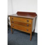 A late Victorian inlaid mahogany three drawer chest