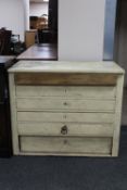 A painted pine six drawer chest