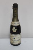 An antique bottle of Moet & Chandon champagne (brought back from France by the recipient of the