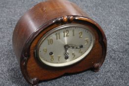 An early 20th century mahogany cased mantel clock with silvered dial