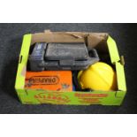 A box containing hard hat,