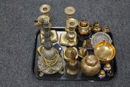 A tray of two pairs of brass candlesticks, ornate lamp base,