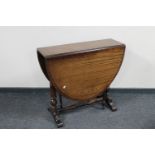 An inlaid mahogany drop leaf table together with a vintage style telephone