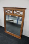 A sheesham wood overmantel mirror