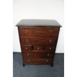 A Stag Minstrel seven drawer chest