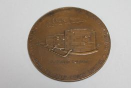 A Mobil Oil Gold Coast Limited commemorative medallion,