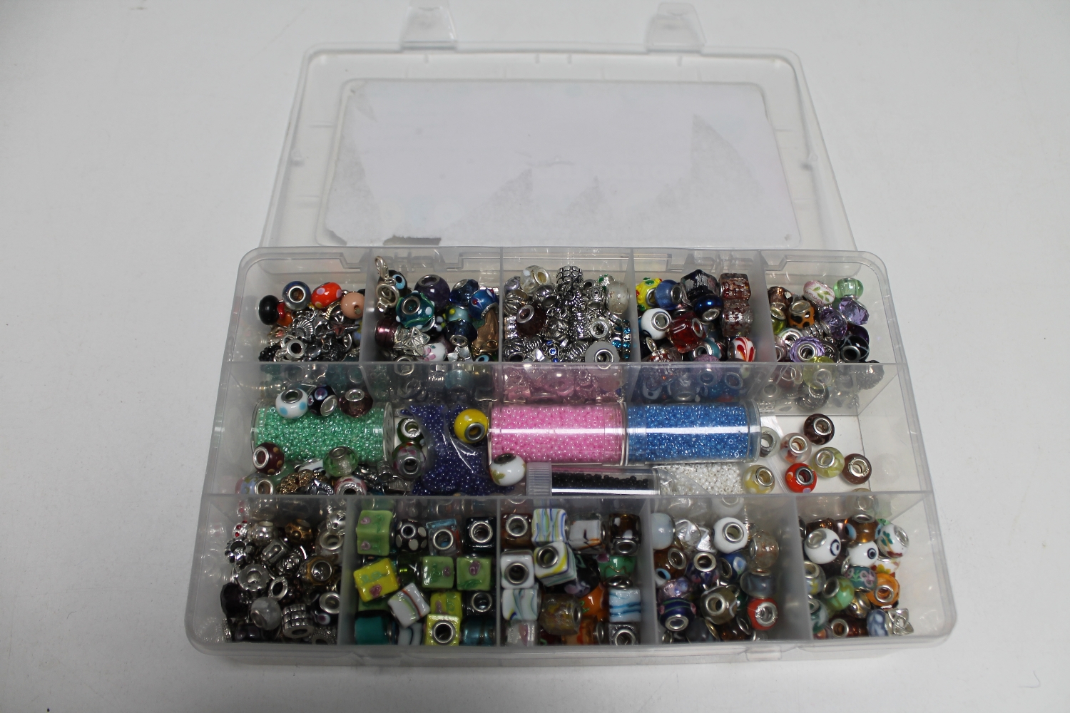 A box of a very large quantity of loose necklace beads