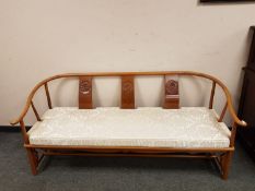 A Chinese four piece lounge suite comprising three seater settee,