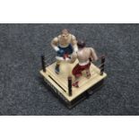 A novelty cast iron boxing money box