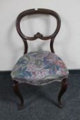 A Victorian mahogany balloon back chair