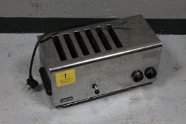 A commercial Lincat stainless steel six-division toaster