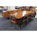 A G-Plan teak dining room suite comprising of extending dining table,